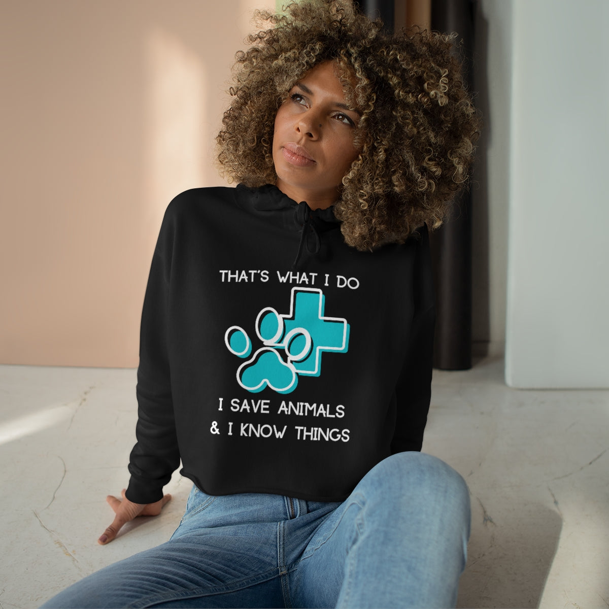 "That's what I do, I save animals & I know things" Crop Hoodie