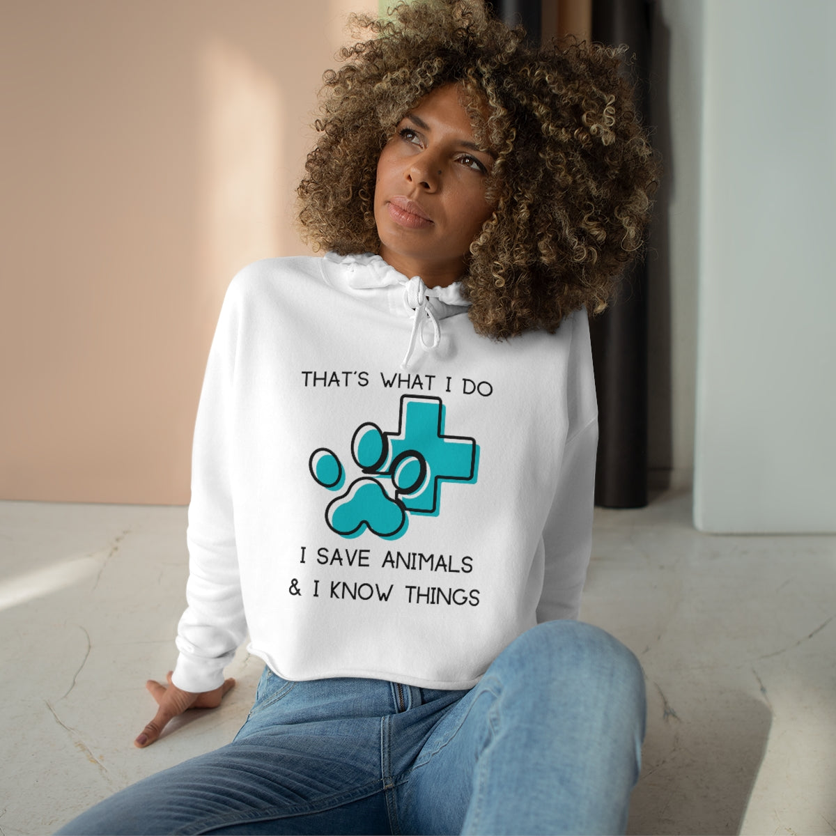 "That's what I do, I save animals & I know things" Crop Hoodie