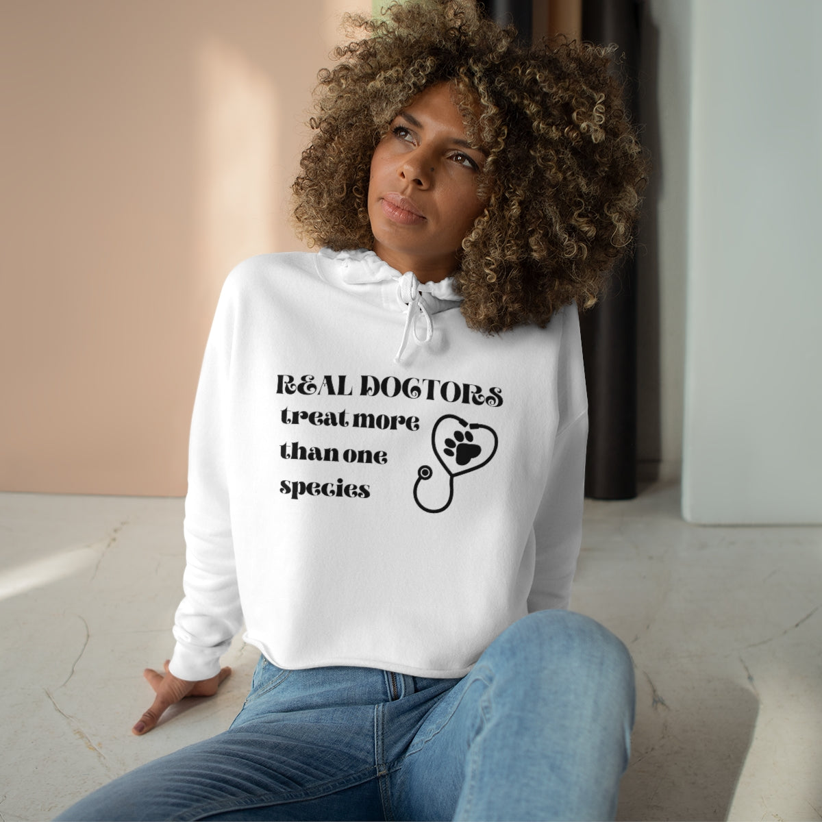 "Real doctors treat more than one species" Crop Hoodie