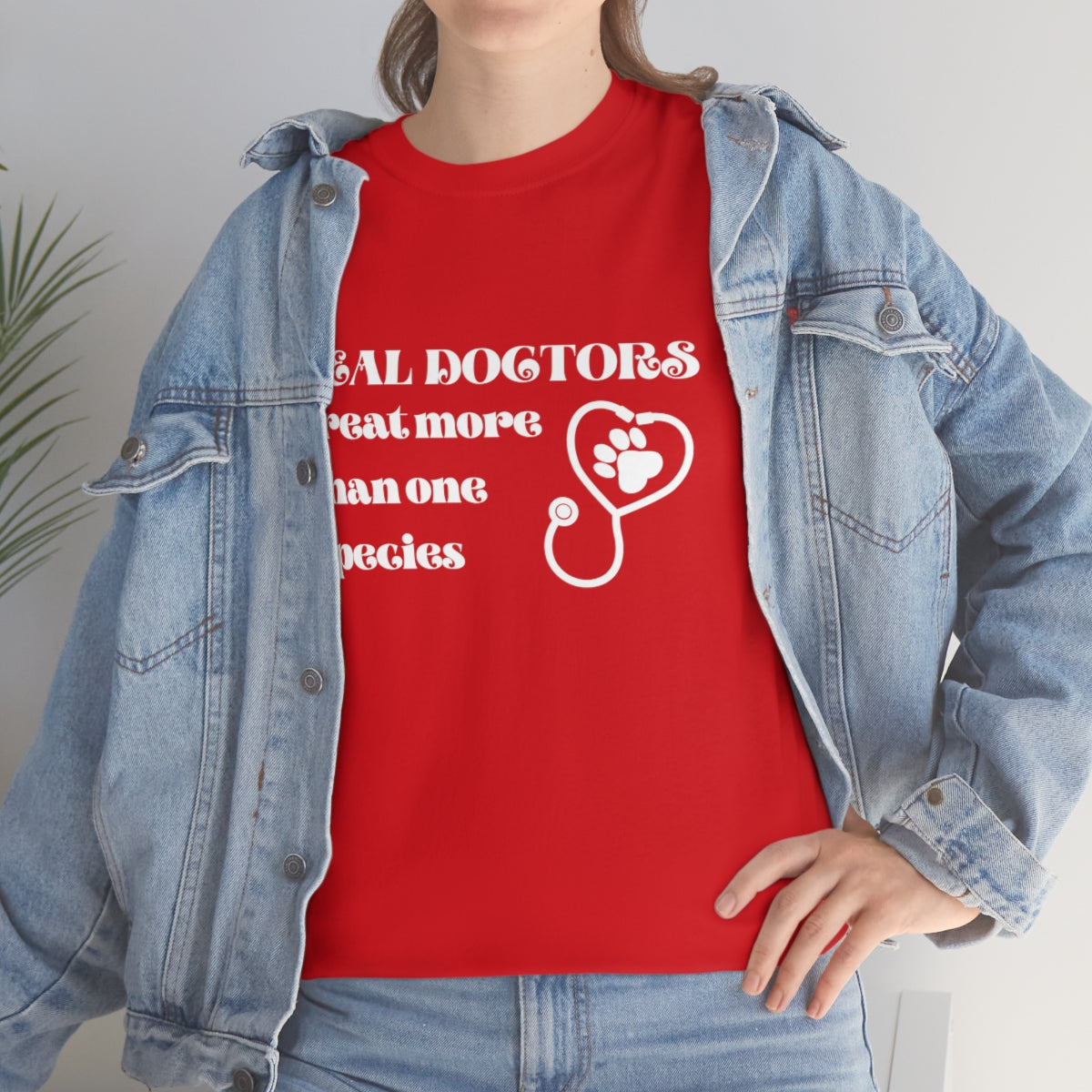 "Real doctors treat more than one species" Tee